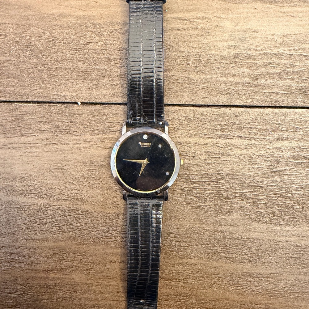 Seiko Black and Gold Men's Watch